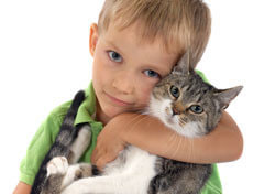 child with cat